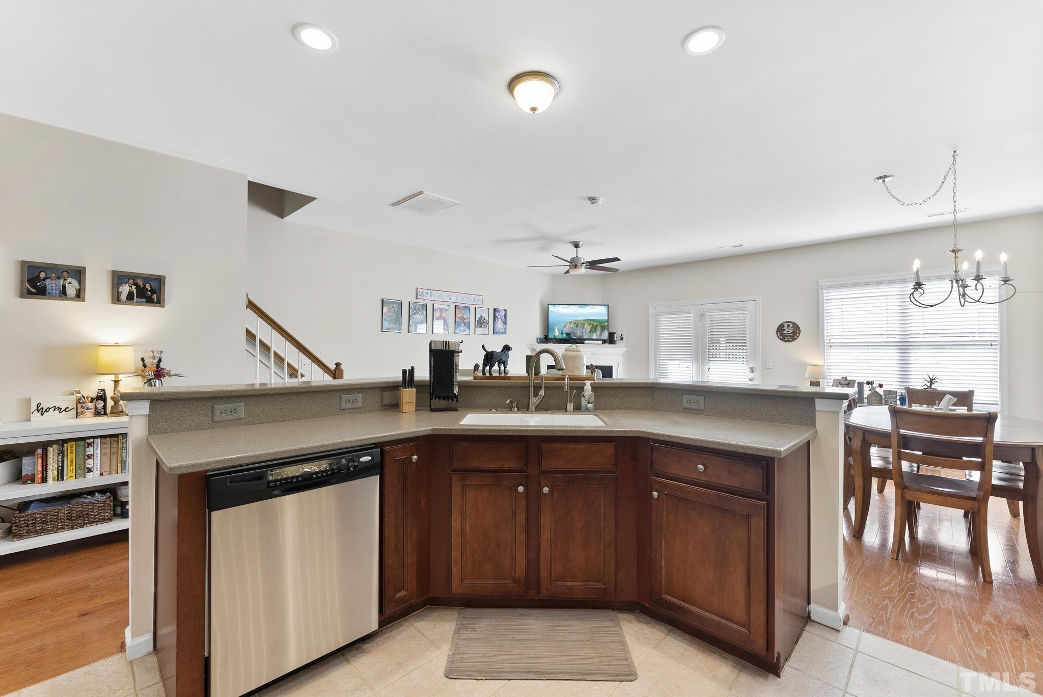 2631 Asher View Court Raleigh, NC 27606 - Photo 6 of 27 Tile floor, solid surface counters & stainless steel appliances