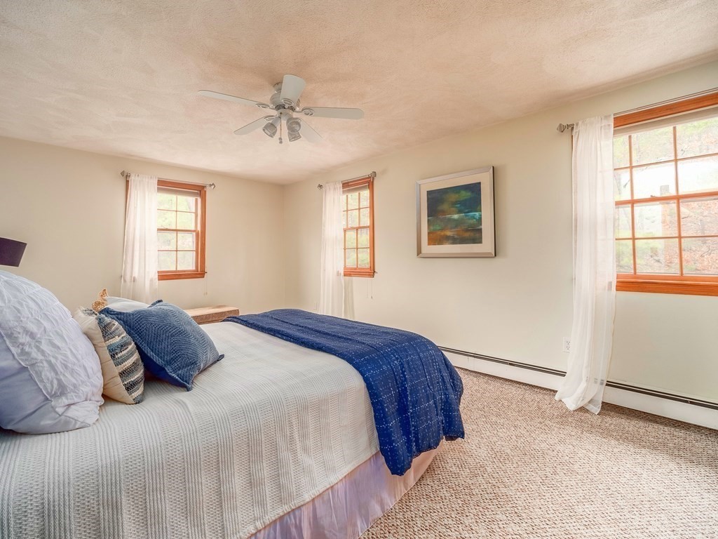 59 Rattlesnake Hill Road Andover, MA 01810 - Photo 26 of 39 a bedroom with a bed and a window