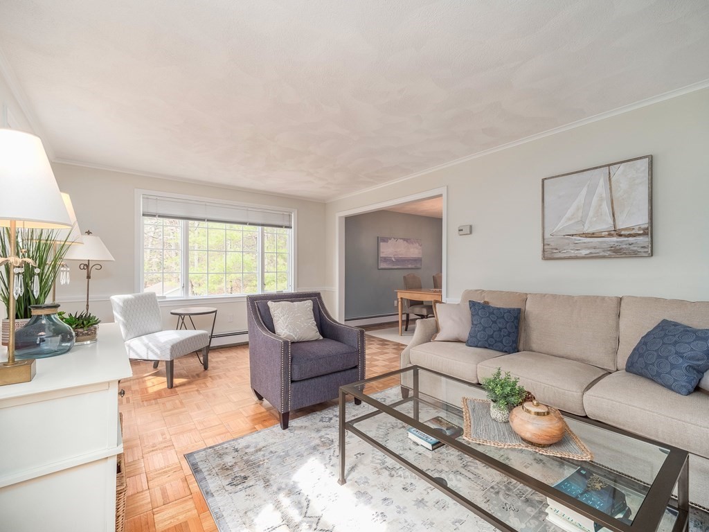 59 Rattlesnake Hill Road Andover, MA 01810 - Photo 3 of 39 a living room with furniture and a wooden floor