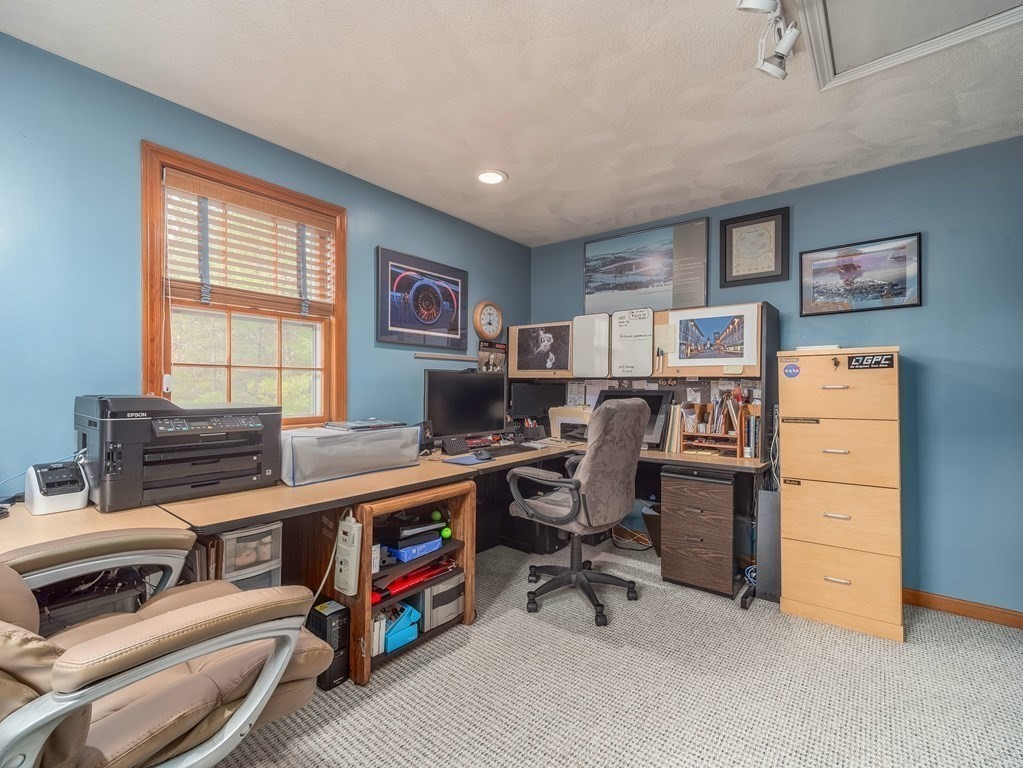 59 Rattlesnake Hill Road Andover, MA 01810 - Photo 31 of 39 a view of a workspace with furniture and a window