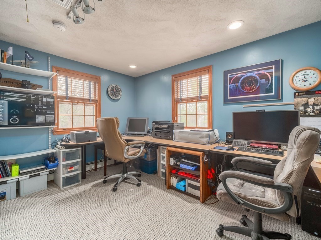 59 Rattlesnake Hill Road Andover, MA 01810 - Photo 33 of 39 a view of a workspace with furniture and a window