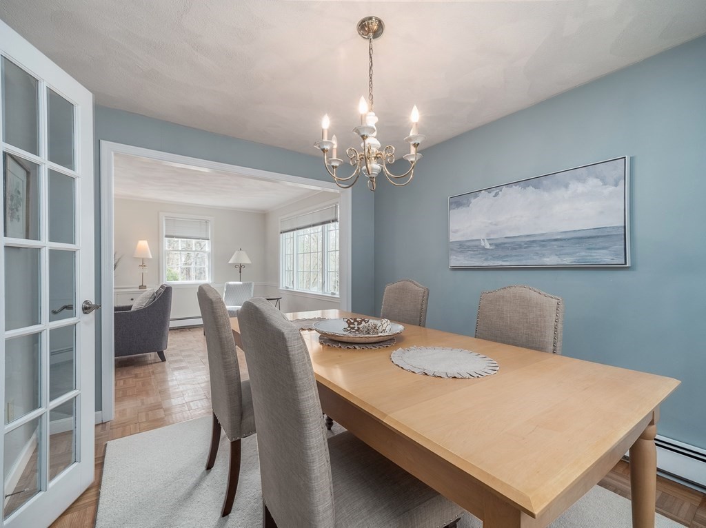 59 Rattlesnake Hill Road Andover, MA 01810 - Photo 7 of 39 a view of a dining room with furniture and chandelier