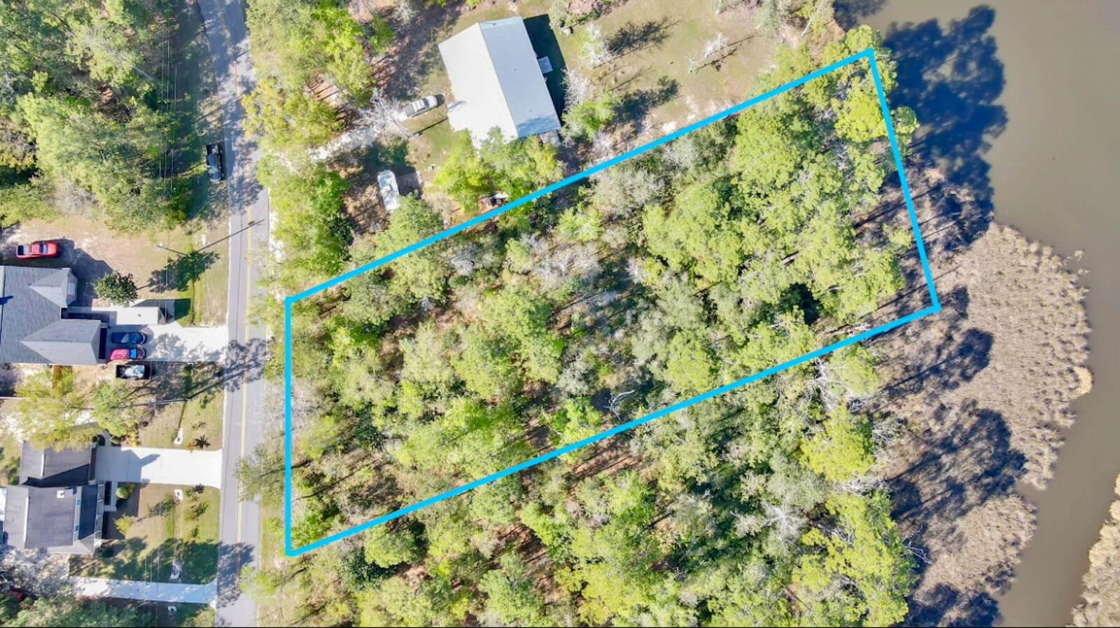 Lot 4 Bay Grove Road Freeport, FL 32439 - Photo 2 of 9 a city view with a green space and wooden floor