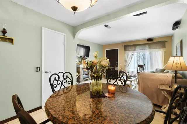 a view of a dining room with furniture