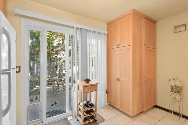 a bathroom with a shower and a window