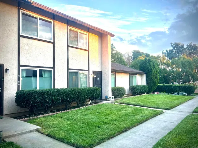 a house view with a garden space