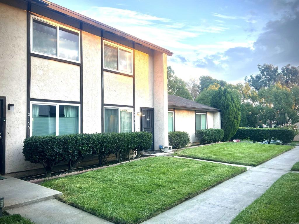 10158 Carefree Drive Santee, CA 92071 - Photo 2 of 38 a house view with a garden space