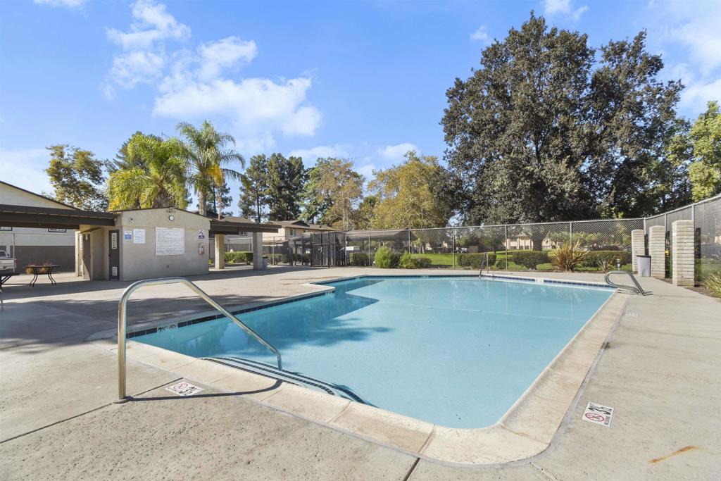 10158 Carefree Drive Santee, CA 92071 - Photo 28 of 38 a view of a swimming pool with a lounge chairs