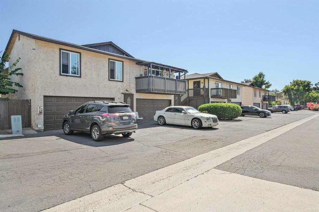 10158 Carefree Drive Santee, CA 92071 - Photo 32 of 38 a car parked in front of a house