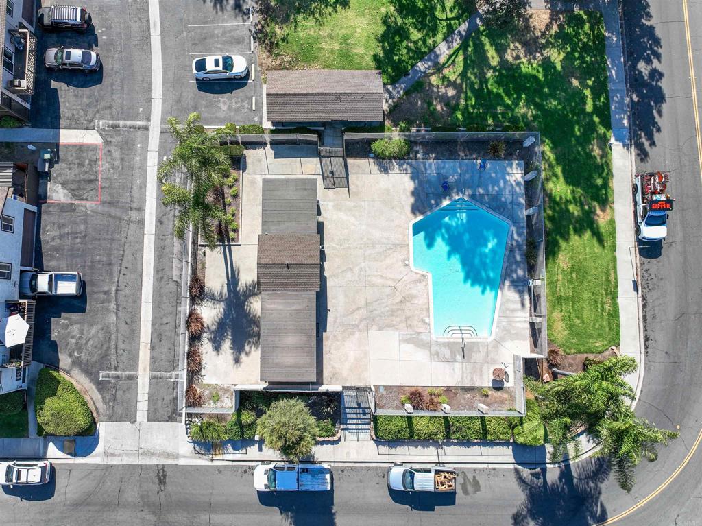 10158 Carefree Drive Santee, CA 92071 - Photo 35 of 38 a building with potted plants in front of it