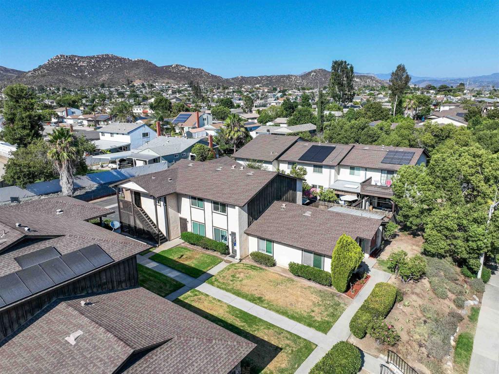 10158 Carefree Drive Santee, CA 92071 - Photo 36 of 38 an aerial view of multiple houses with a yard