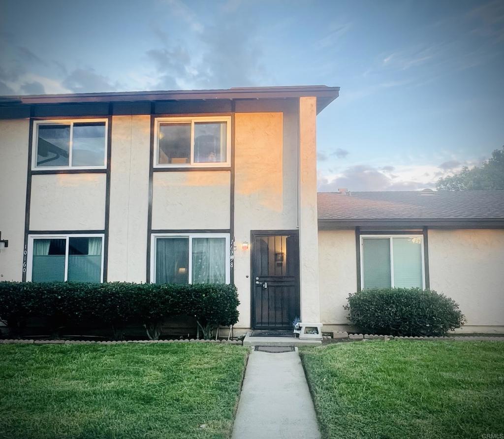 10158 Carefree Drive Santee, CA 92071 - Photo 6 of 38 a front view of a house with a yard