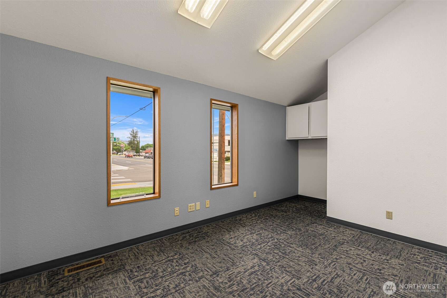 710 North Miller Street Wenatchee, WA 98801 - Photo 19 of 33 a view of an empty room with window and kitchen view