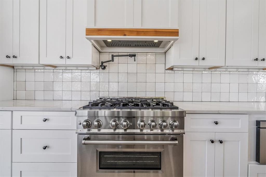 4401 Battle Ridge Road Oakdale, PA 15071 - Photo 19 of 50 a stove top oven sitting inside of a kitchen