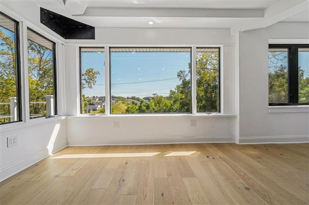 4401 Battle Ridge Road Oakdale, PA 15071 - Photo 24 of 50 a view of an empty room with wooden floor and a window