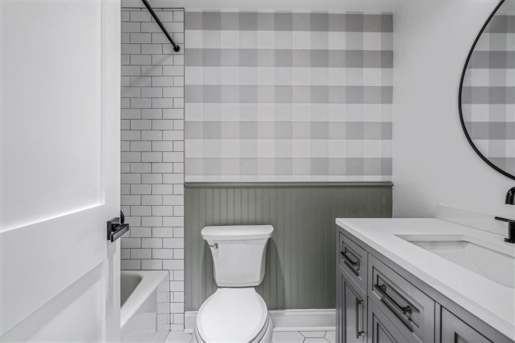 4401 Battle Ridge Road Oakdale, PA 15071 - Photo 29 of 50 a bathroom with a sink a toilet and a mirror