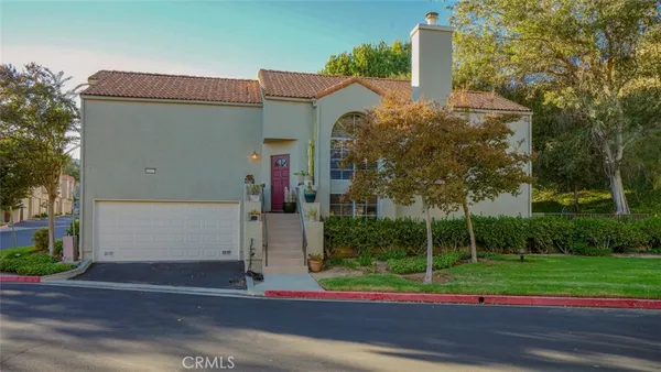 front view of house with a small yard
