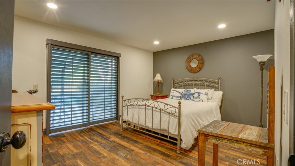 11327 Old Ranch Circle Chatsworth, CA 91311 - Photo 38 of 63 a bedroom with a bed and a window