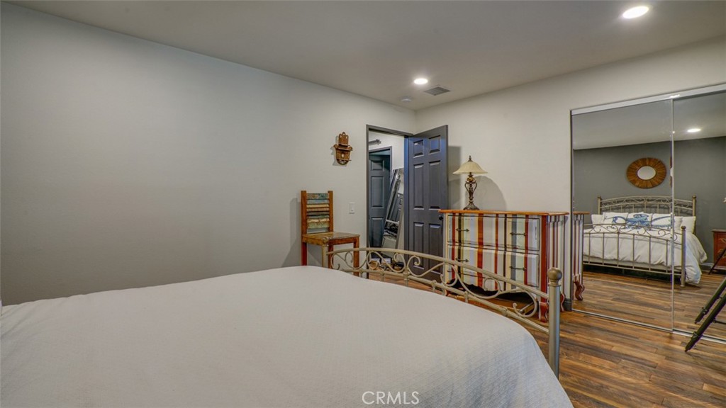 11327 Old Ranch Circle Chatsworth, CA 91311 - Photo 39 of 63 a bedroom with double bed and a window