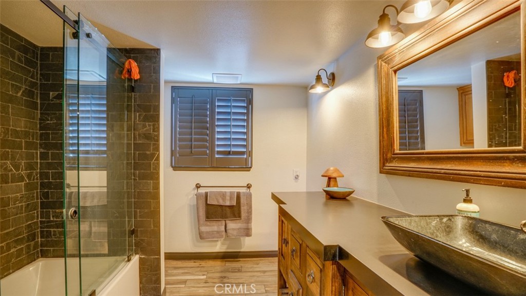 11327 Old Ranch Circle Chatsworth, CA 91311 - Photo 41 of 63 a bathroom with a sink and a mirror