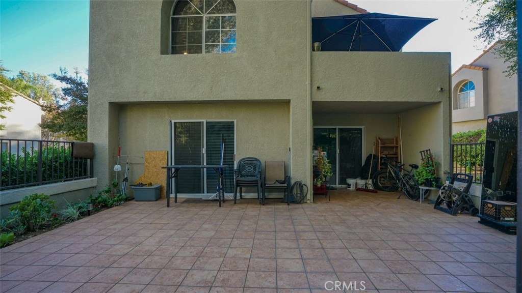 11327 Old Ranch Circle Chatsworth, CA 91311 - Photo 45 of 63 a backyard of a house with yard and outdoor seating