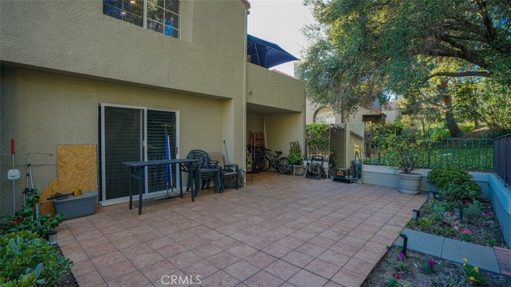 11327 Old Ranch Circle Chatsworth, CA 91311 - Photo 47 of 63 a view of a house with backyard and sitting area
