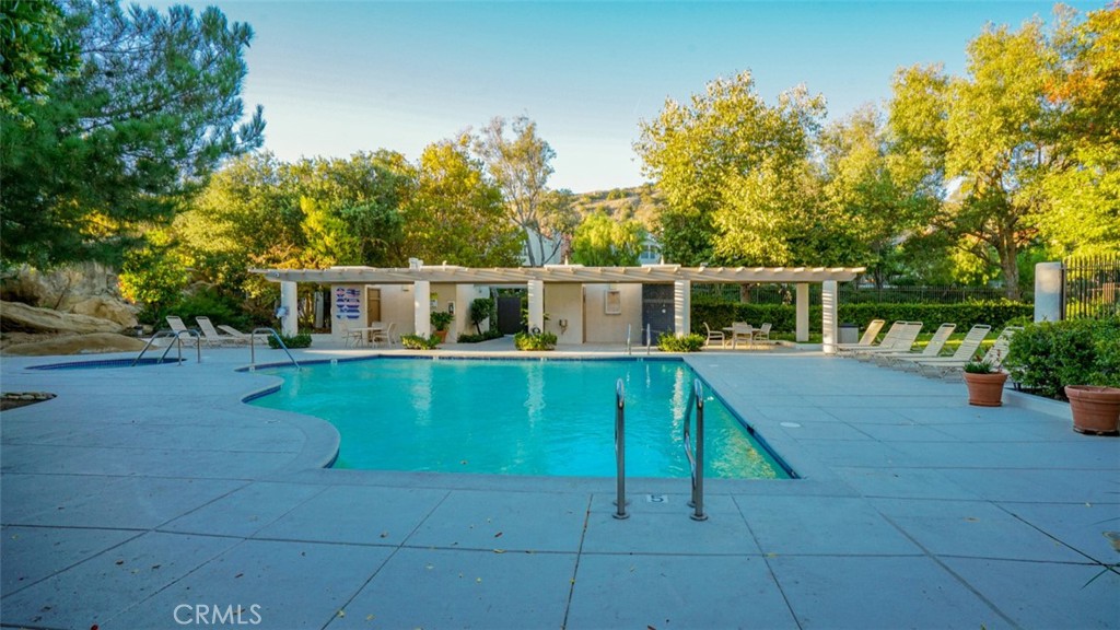 11327 Old Ranch Circle Chatsworth, CA 91311 - Photo 54 of 63 a house view with a sitting space and garden