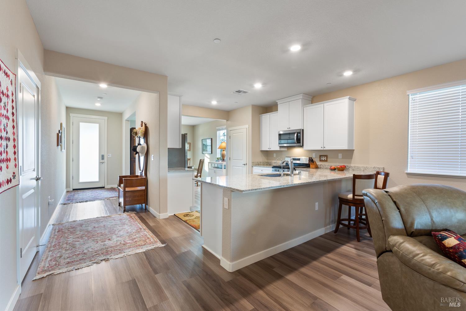 2080 Revival Lane Rio Vista, CA 94571 - Photo 21 of 40 a kitchen with stainless steel appliances granite countertop a refrigerator and a sink