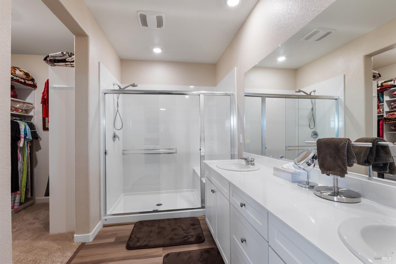 2080 Revival Lane Rio Vista, CA 94571 - Photo 27 of 40 a bathroom with a double vanity sink a mirror and shower
