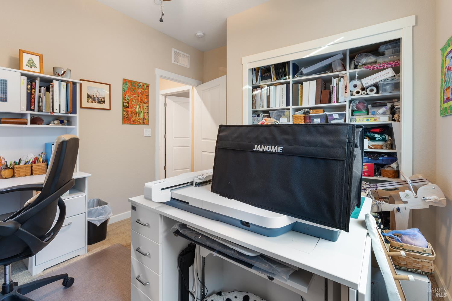 2080 Revival Lane Rio Vista, CA 94571 - Photo 33 of 40 a living room with a couch and bookshelf