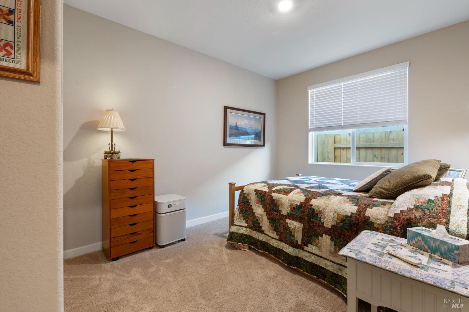 2080 Revival Lane Rio Vista, CA 94571 - Photo 34 of 40 a bedroom with a bed and a window