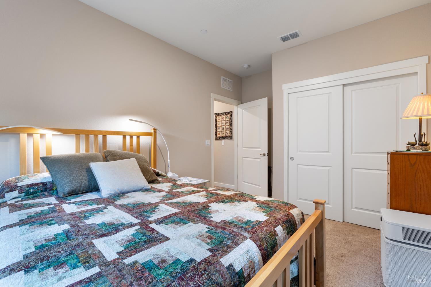 2080 Revival Lane Rio Vista, CA 94571 - Photo 35 of 40 a bedroom with a bed and wooden floor