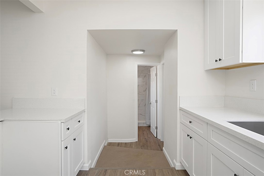 6056 Colonial Drive Riverside, CA 92506 - Photo 17 of 30 a view of a hallway with closet