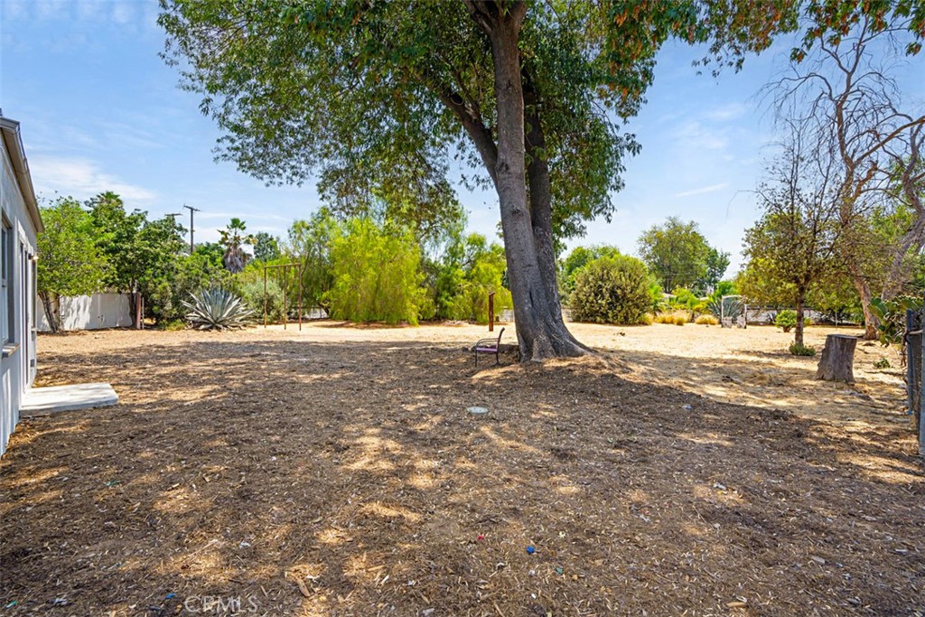 6056 Colonial Drive Riverside, CA 92506 - Photo 27 of 30 a view of road view with large trees
