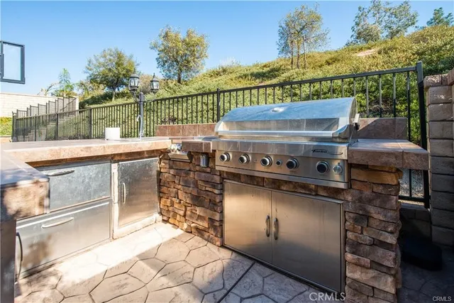 a view of a chairs and table in the terrace