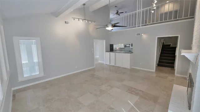 a kitchen with stainless steel appliances granite countertop a sink and cabinets