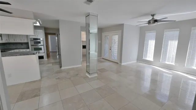 a bathroom with a glass shower door