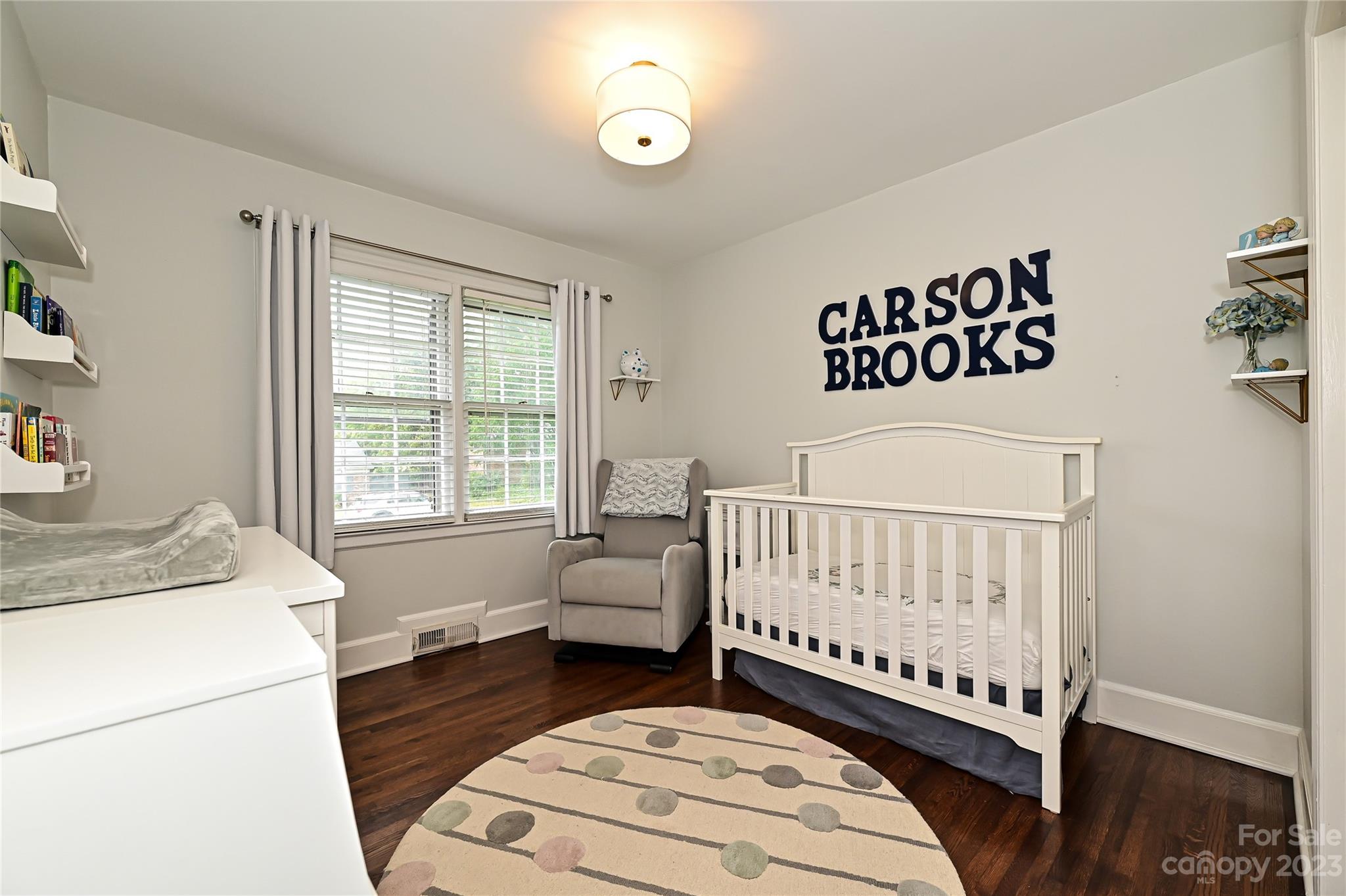 5511 Valley Forge Road Charlotte, NC 28210 - Photo 14 of 22 a bedroom with a bed and a window