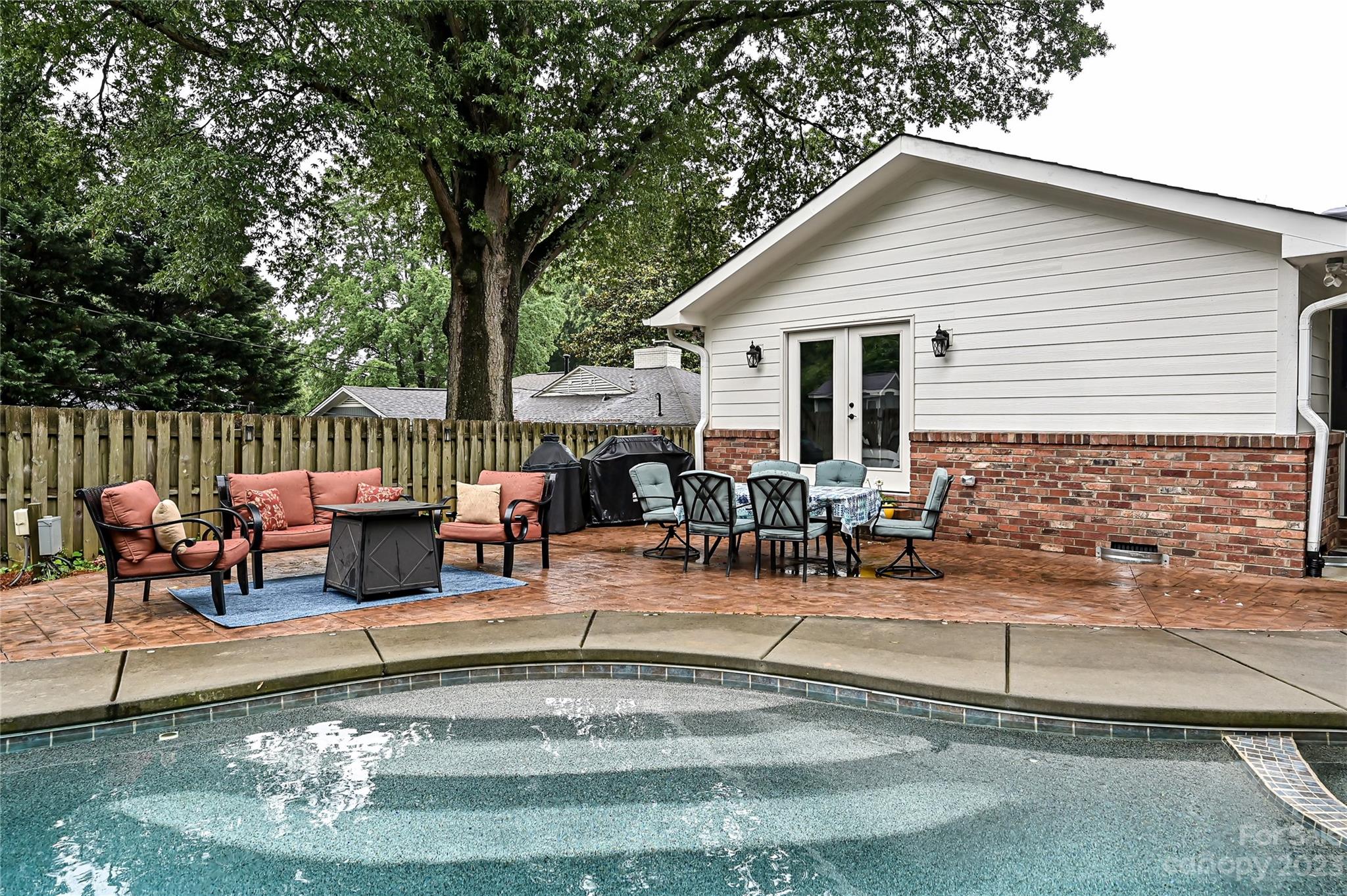 5511 Valley Forge Road Charlotte, NC 28210 - Photo 21 of 22 a view of a house with backyard and sitting area