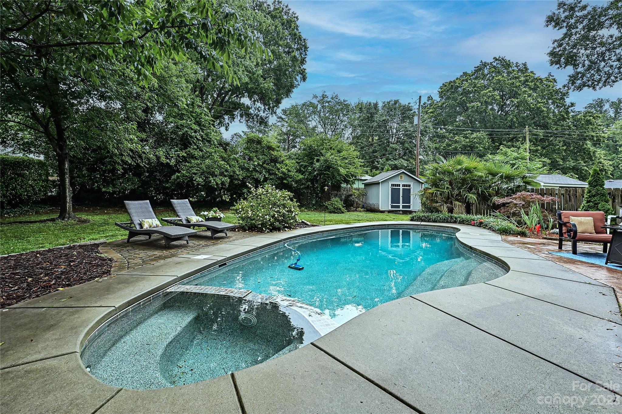 5511 Valley Forge Road Charlotte, NC 28210 - Photo 22 of 22 a view of a swimming pool with a patio