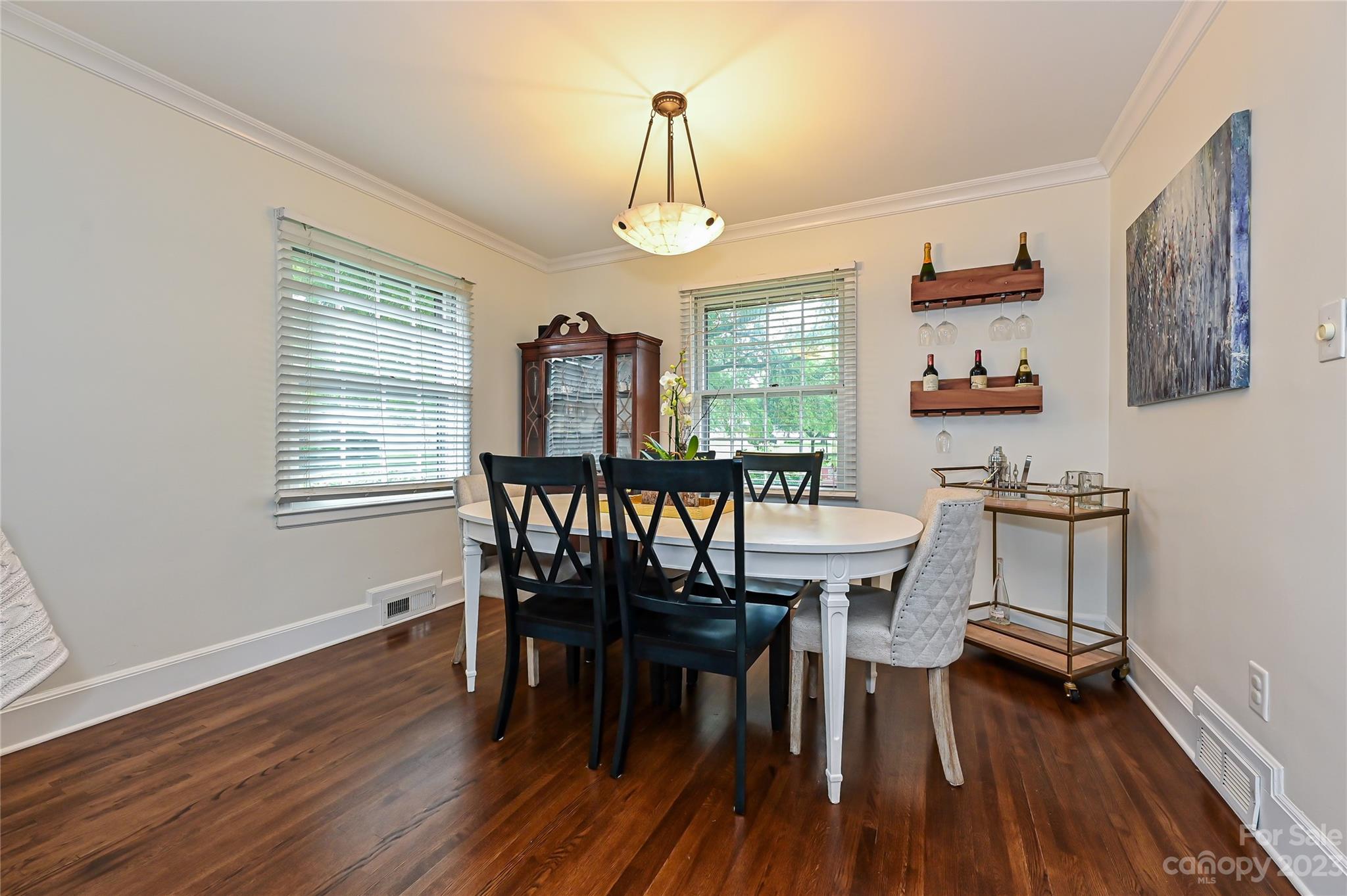 5511 Valley Forge Road Charlotte, NC 28210 - Photo 5 of 22 a view of a dining room with furniture window and wooden floor