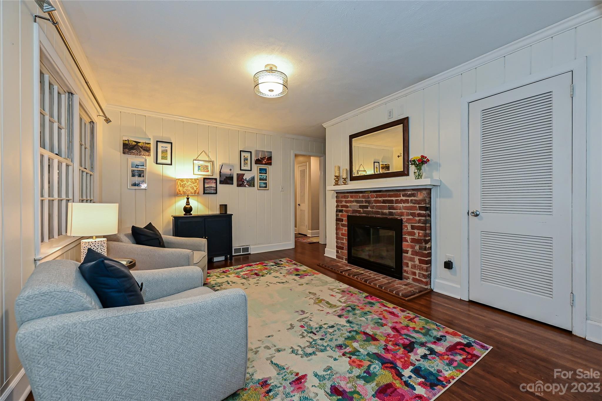 5511 Valley Forge Road Charlotte, NC 28210 - Photo 9 of 22 a living room with furniture and a fireplace
