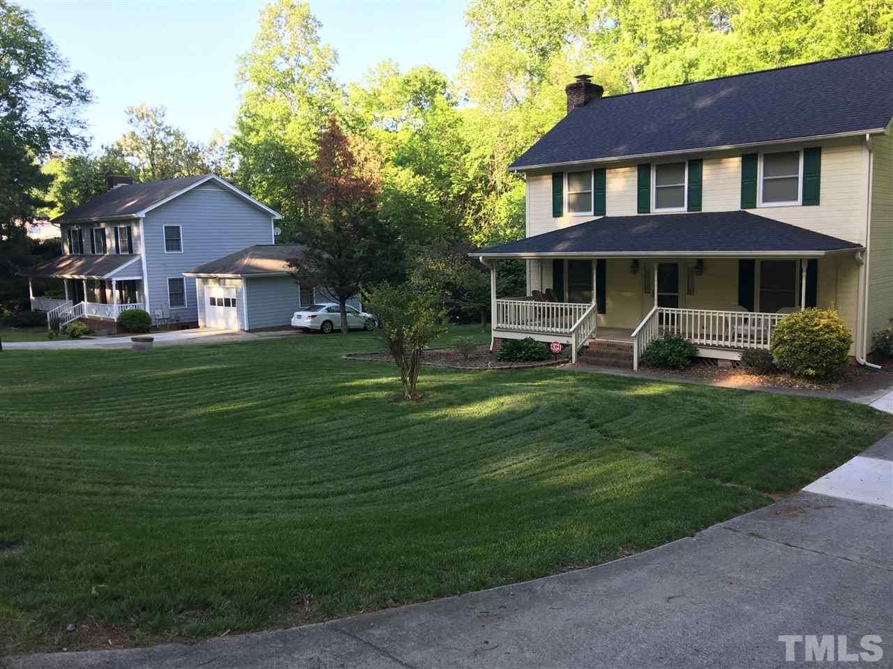 105 Singleton Street Raleigh, NC 27606 - Photo 4 of 10 a front view of a house with a yard