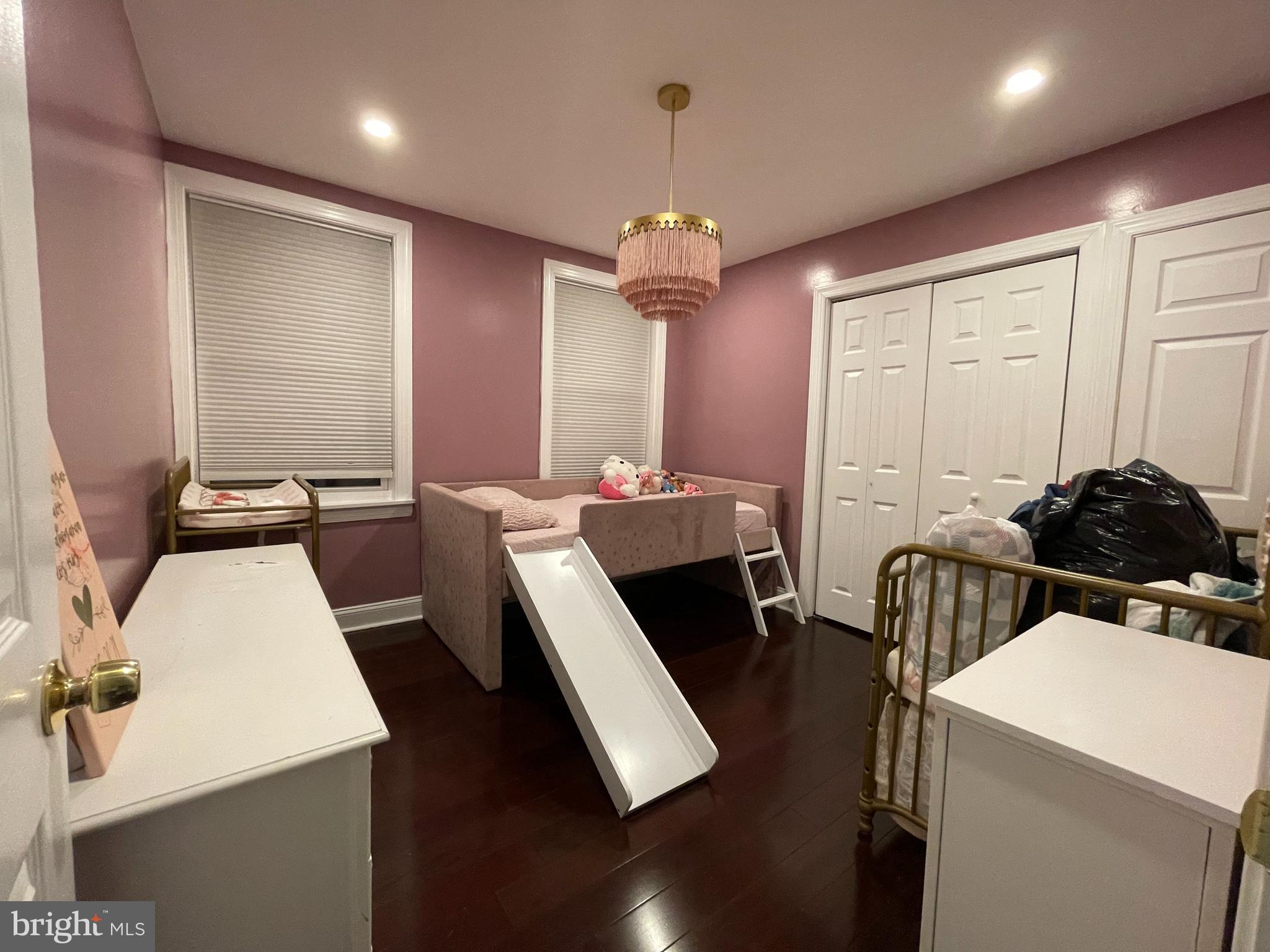 147 Lexington Avenue Lansdowne, PA 19050 - Photo 20 of 32 a room with furniture a chandelier a flat screen tv and a chandelier