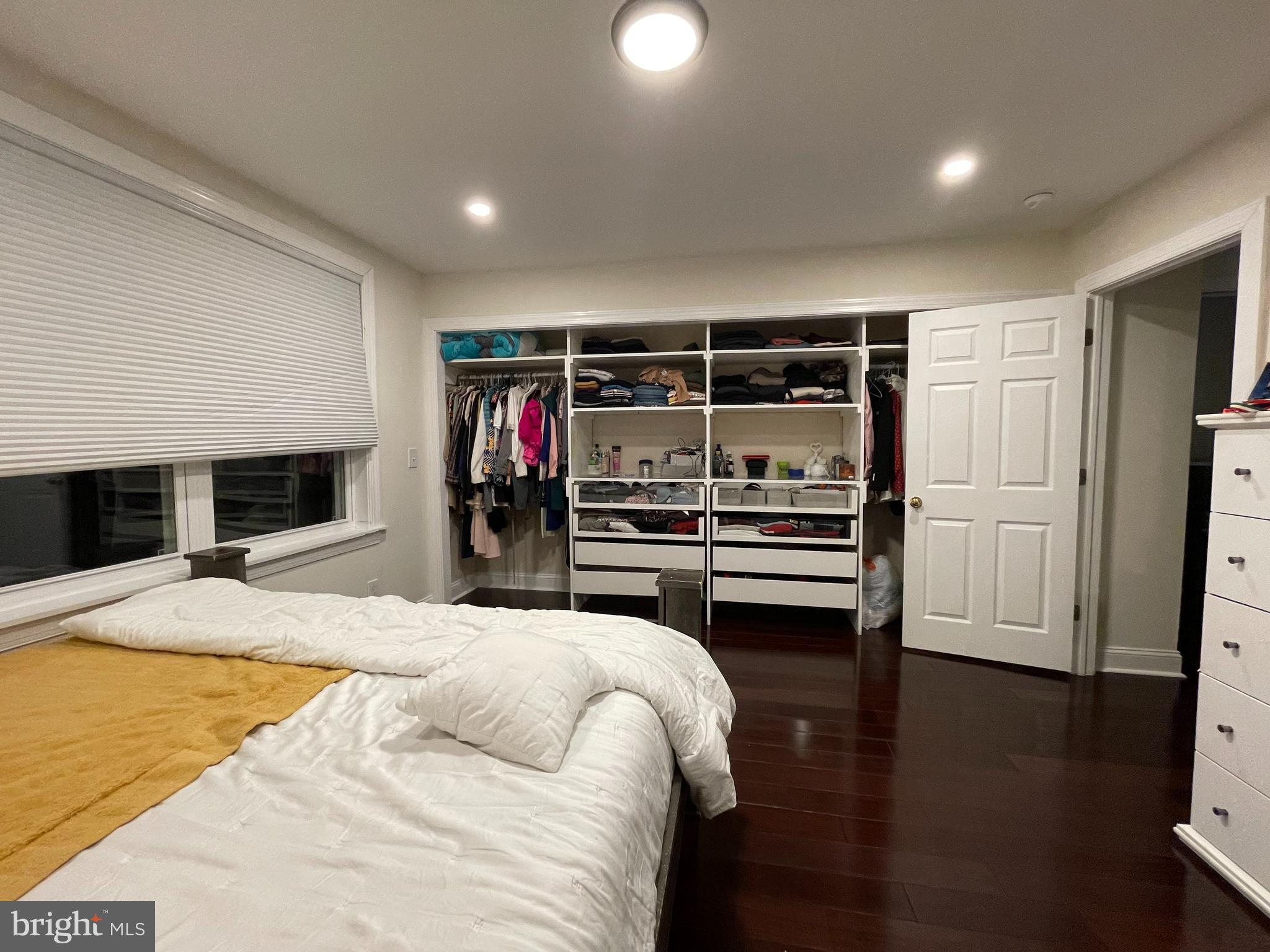 147 Lexington Avenue Lansdowne, PA 19050 - Photo 25 of 32 a bedroom with a bed and wooden floor