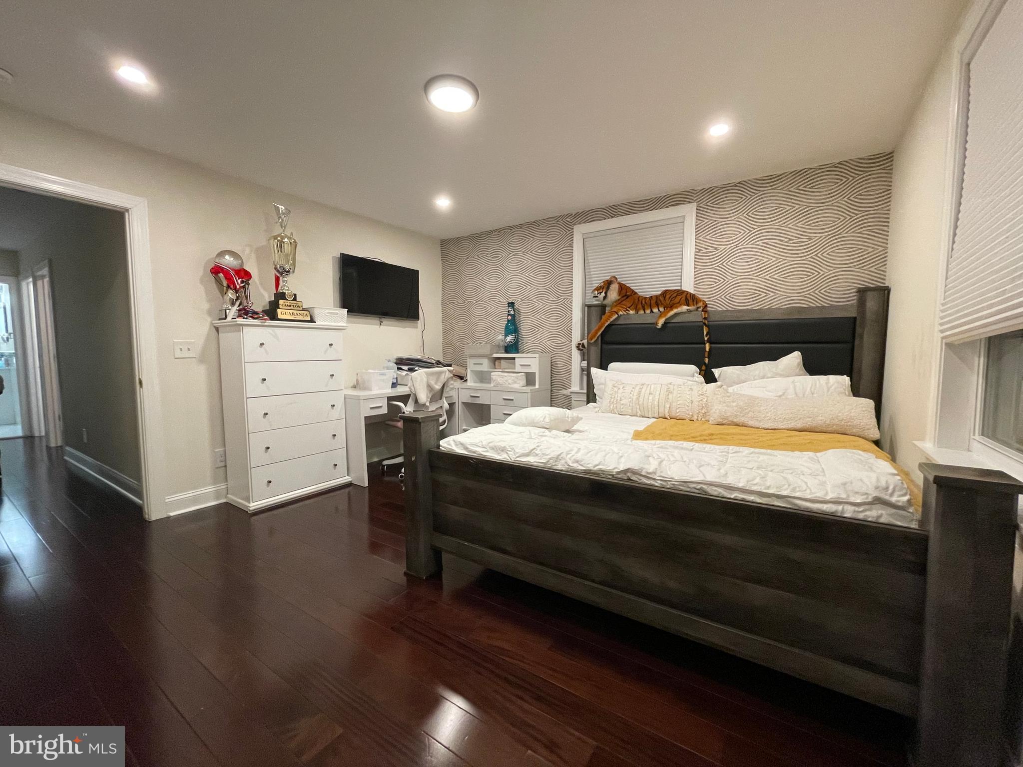 147 Lexington Avenue Lansdowne, PA 19050 - Photo 26 of 32 a bed room with furniture and mirror