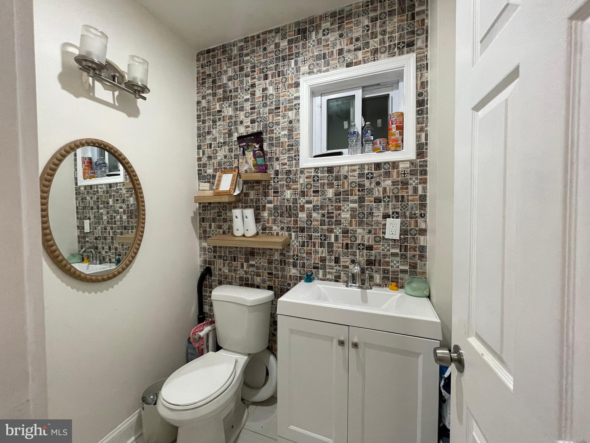 147 Lexington Avenue Lansdowne, PA 19050 - Photo 30 of 32 a white toilet sitting next to a small bathroom