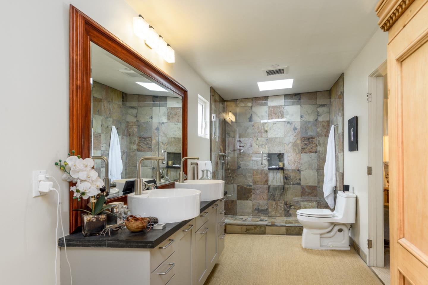 215 Mirada Road Half Moon Bay, CA 94019 - Photo 12 of 47 a bathroom with a bathtub shower sink and toilet