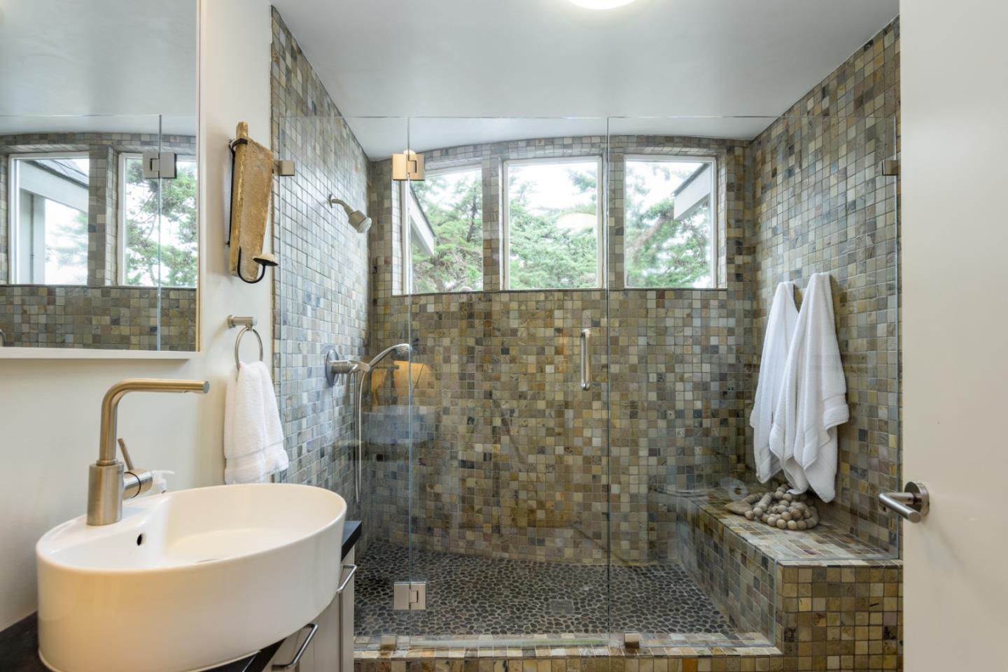 215 Mirada Road Half Moon Bay, CA 94019 - Photo 16 of 47 a bathroom with a sink and a mirror