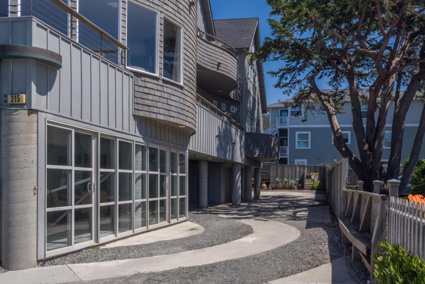 215 Mirada Road Half Moon Bay, CA 94019 - Photo 3 of 47 a view of a building with a tree